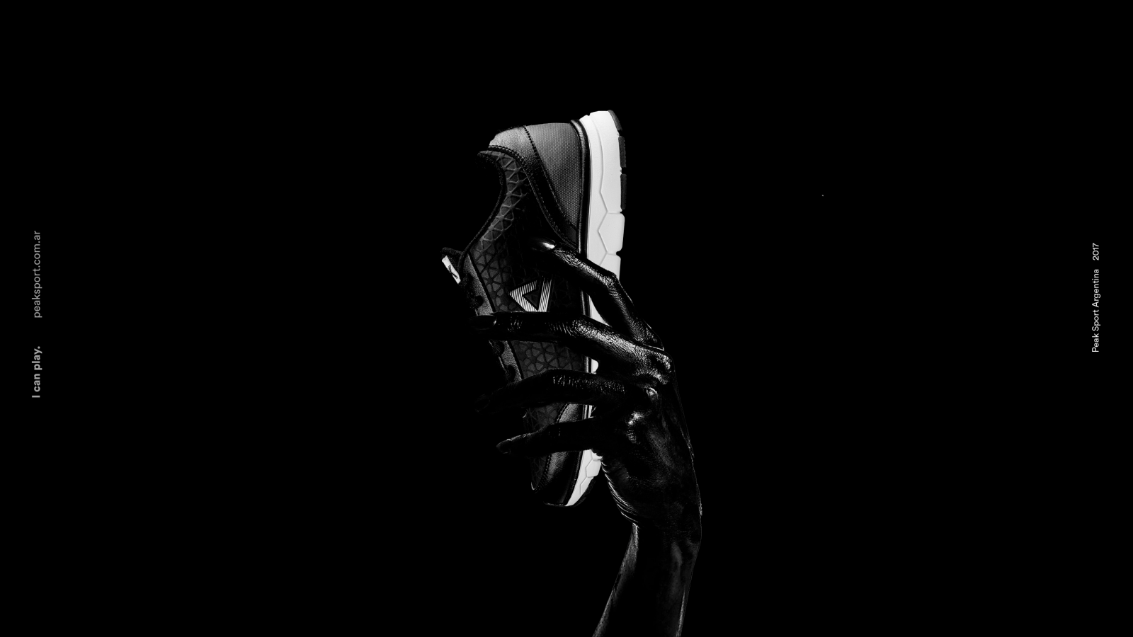 Card image cap of project with visual effects, hand holding shoe, black&white image