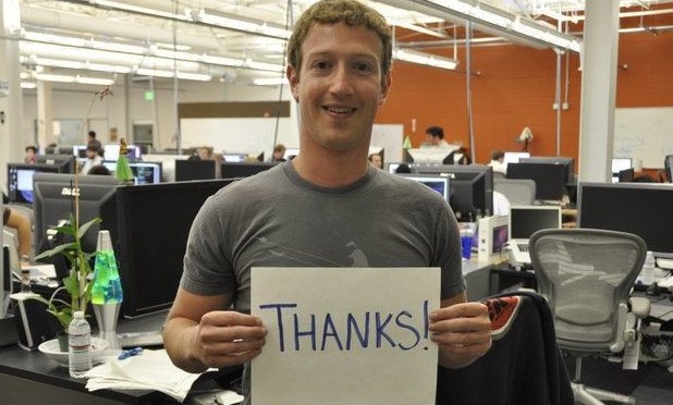 Second slide of happy client, Mark Zuckerberg keeping thanks! table in his hands